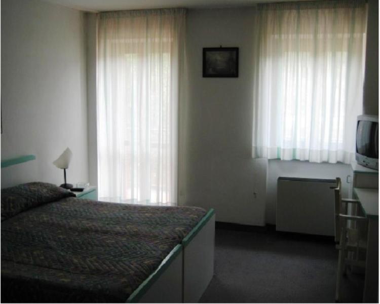 Hotel Il Giardino Доляни Стая снимка